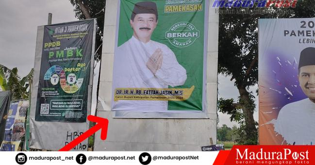 Baleho Rudi Susanto Calon Bupati Pamekasan Ditutupi Baleho Fattah Jasin